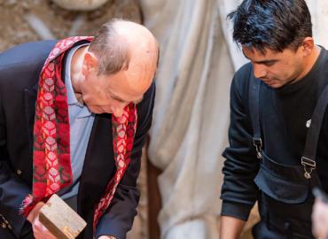 Prince Edward tries his hand at wood carving in Bhaktapur